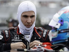 Robert Wickens prepares to qualify for Sunday's IndyCar series auto race, Saturday, Aug. 18, 2018, in Long Pond, Pa.