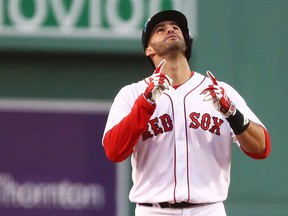 J.D. Martinez #28 of the Boston Red Sox reacts after hitting a double in the first inning of a game against the Cleveland Indians at Fenway Park on August 20, 2018 in Boston, Massachusetts. (Photo by Adam Glanzman/Getty Images)