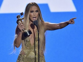 Jennifer Lopez accepts the Video Vanguard award at the MTV Video Music Awards at Radio City Music Hall on Monday, Aug. 20, 2018, in New York.