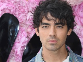 Joe Jonas attends the Dior Homme Menswear Spring/Summer 2019 show as part of Paris Fashion Week on June 23, 2018 in Paris. (Pascal Le Segretain/Getty Images)