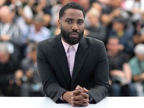 John David Washington poses on May 15, 2018 during a photocall for the film BlacKkKlansman at the 71st edition of the Cannes Film Festival in Cannes, southern France. (Valery Hache/ AFP)