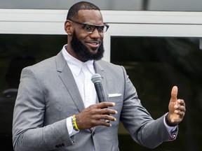 LeBron James speaks at the opening ceremony for the I Promise School in Akron, Ohio on Monday, July 30, 2018. (AP Photo/Phil Long)