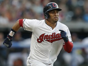 In this Aug. 4, 2018, file photo, Cleveland Indians' Leonys Martin runs out a ground ball against the Los Angeles Angels in Cleveland. (AP Photo/Tony Dejak, File)