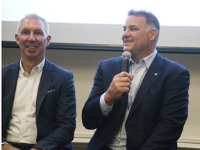 CFL vice president football operations and player safety Kevin McDonald, left, and Eric Lindros take part in a panel discussion at the See The Line concussion symposium at Western University  in London, Ont. on Thursday August 16, 2018. (Derek Ruttan/The London Free Press/Postmedia Network)