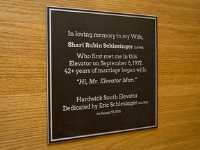 This Wednesday, Aug. 15, 2018, photo provided by Temple University shows a plaque commemorating a 45-year relationship that began when Sharyn Rubin first met Eric Schlesinger as he held open elevator doors in a dorm for her during move-in day on Sept. 6, 1972, with the plaque installed outside the elevator where they met at the university in Philadelphia. (Joseph V. Labolito/Temple University via AP)