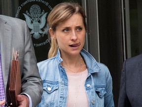 Actress Allison Mack leaves Federal court, Wednesday, July 25, 2018, in the Brooklyn borough of New York  City.