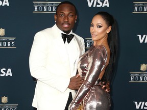 In this Feb. 4, 2017 file photo, LeSean McCoy of the Buffalo Bills, left, and Delicia Cordon arrive at the 6th annual NFL Honors at the Wortham Center in Houston. Cordon, McCoy's ex-girlfriend, is suing the Buffalo Bills running back for failing to protect her after she was bloodied, beaten and had $133,000 worth of jewelry stolen during a home invasion last month.