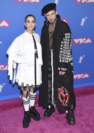 Bethany C. Meyers, left, and Nico Tortorella arrive at the MTV Video Music Awards at Radio City Music Hall on Monday, Aug. 20, 2018, in New York. (Evan Agostini/Invision/AP)