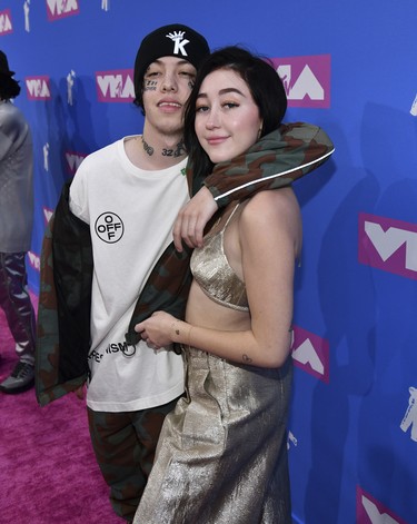 Lil Xan, left, and Noah Cyrus arrive at the MTV Video Music Awards at Radio City Music Hall on Monday, Aug. 20, 2018, in New York. (Charles Sykes/Invision/AP)
