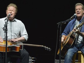 FILE - In this Jan. 15, 2014, file photo, Don Henley, left, and Glenn Frey of The Eagles perform on the "History of the Eagles" tour at the Forum in Los Angeles. The Eagles' greatest hits album has surpassed Michael Jackson's "Thriller" as the best-selling album of all-time.