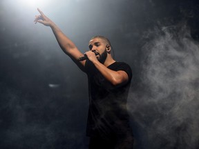 In this June 27, 2015 file photo, Drake performs on the main stage at Wireless festival in Finsbury Park, London. (Photo by Jonathan Short/Invision/AP, File)