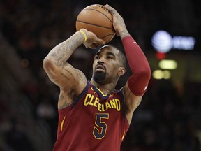 Cleveland Cavaliers' J.R. Smith shoots against the Detroit Pistons in the first half of game in Cleveland on Jan. 28, 2018.