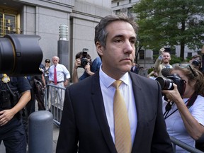 Michael Cohen, former personal lawyer to President Donald Trump, leaves federal court after reaching a plea agreement in New York, Tuesday, Aug. 21, 2018.