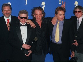 Members of the 1960's band "The Jefferson Airplane," from left, Jorma Kaukonen, Jack Casady, Paul Kantner, Marty Balin, and Spencer Dryden pose backstage after the band's induction into the  Rock and Roll Hall of Fame in New York on Jan. 17, 1996.