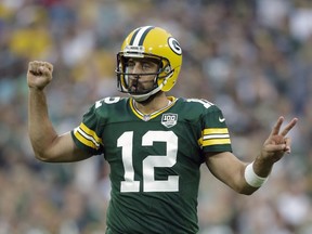 In this Aug. 16, 2018, file photo, Green Bay Packers' Aaron Rodgers gestures during the first half of a preseason NFL game against the Pittsburgh Steelers, in Green Bay, Wis.