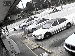 In this frame from surveillance video released by the Pinellas County Sheriff's Office, Markeis McGlockton, far left, is shot by Michael Drejka during an altercation in the parking lot of a convenience store in Clearwater, Fla., on July 19, 2018.  (Pinellas County Sheriff's Office via AP, File)