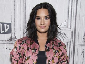 In this March 20, 2017 file photo, Demi Lovato participates in the BUILD Speaker Series to discuss "Smurfs: The Lost Village" in New York.