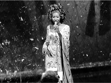 In this April 8, 1975 file photo, singer Aretha Franklin performs during the 47th Annual Academy Awards ceremony in Los Angeles.