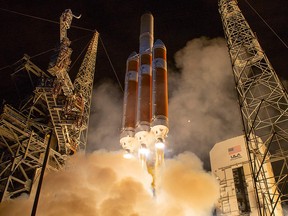 This handout photograph courtesy of NASA shows the United Launch Alliance Delta IV Heavy rocket launching NASA's Parker Solar Probe to touch the Sun, Sunday, August 12, 2018 from Launch Complex 37 at Cape Canaveral Air Force Station, Florida. (Getty Images)