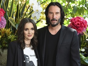 Winona Ryder and Keanu Reeves attend the "Destination Wedding" photo call on Saturday, Aug. 18, 2018, in Los Angeles. (Jordan Strauss/Invision/AP)