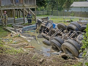 A septic truck overturned and crashed into a swimming pool Thursday, Aug. 9, 2018, on Slackwater Rd. at Stehman Rd. in Conestoga Township, Lancaster County, Pa.