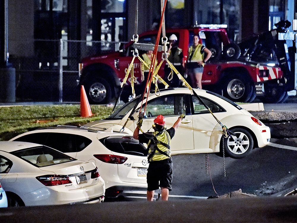 6 cars swallowed by sinkhole under outlet mall parking lot