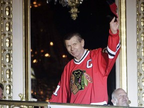 Chicago Blackhawks legend Stan Mikita is introduced on opening night on opening night of the fourth annual Blackhawks Convention in Chicago on Friday, July 15, 2011. (THE CANADIAN PRESS/AP/The Arlington Heights Daily Herald, Brian Hill)
