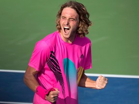 Stefanos Tsitsipas, of Greece, celebrates his win over Kevin Anderson, of South Africa, during Rogers Cup semifinal tennis tournament action in Toronto on Saturday, Aug. 11, 2018.