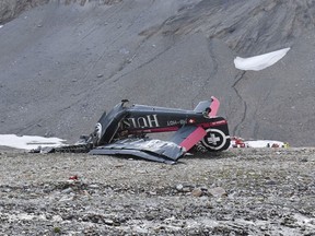 The photo provided by Police Graubuenden shows the wreckage of the old-time propeller plane Ju 52  after it went down went down Saturday Aug, 4 2018 on the Piz Segnas mountain above the Swiss Alpine resort of Flims, striking the mountain's western flank about 2,540 meters (8,330 feet) above sea level.