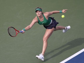 Eugenie Bouchard of Canada returns to Elise Mertens of Belgium during first round action at the Rogers Cup tennis tournament, Tuesday August 7, 2018 in Montreal.