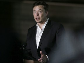 Tesla CEO and founder of the Boring Company Elon Musk speaks at a news conference in Chicago on June 14, 2018.