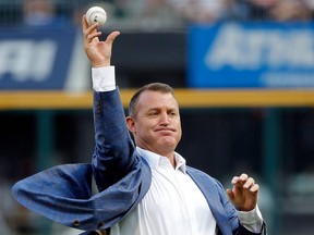 Newly inducted Hall of Famer Jim Thome throws out a ceremonial first pitch before the game between the Chicago White Sox and the Cleveland Indians at Guaranteed Rate Field on Aug. 11, 2018 in Chicago, Ill.