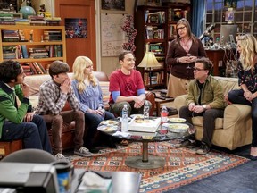 This image released by CBS shows Kunal Nayyar,  from left, Simon Helberg, Melissa Rauch, Jim Parsons, Mayim Bialik, Johnny Galecki and Kaley Cuoco appear in a scene from the long-running comedy series "The Big Bang Theory." The popular series will end in 2019.