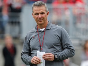 In this April 14, 2018, file photo, Ohio State coach Urban Meyer watches the team's spring game in Columbus, Ohio. (AP Photo/Jay LaPrete, File)