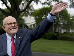 Rudy Giuliani, an attorney for President Donald Trump, waves to people during White House Sports and Fitness Day on the South Lawn of the White House in Washington on May 29, 2018.
