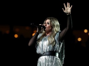 Singer-songwriter Kelly Clarkson performs during the opening night ceremony at Arthur Ashe Stadium on Day One of the 2018 US Open at the USTA Billie Jean King National Tennis Center on August 27, 2017 in the Flushing neighborhood of the Queens borough of New York City.