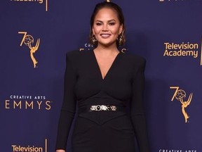 Chrissy Teigen poses in the press room during the 2018 Creative Arts Emmys at Microsoft Theater on September 9, 2018 in Los Angeles, California.