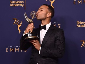 John Legend poses in the press room during the 2018 Creative Arts Emmys at Microsoft Theater on September 9, 2018 in Los Angeles, California.