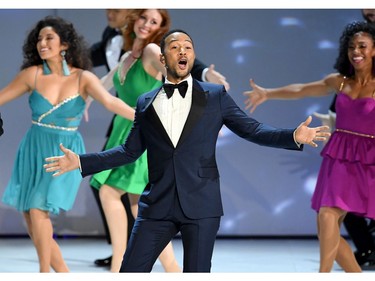 John Legend (C) performs onstage during the 70th Emmy Awards at Microsoft Theater on September 17, 2018 in Los Angeles, California.