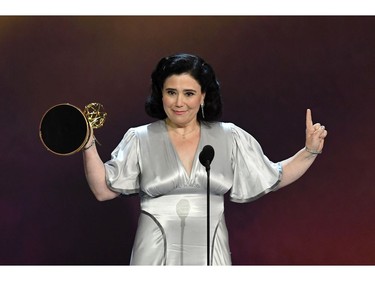 Alex Borstein accepts the Outstanding Supporting Actress in a Comedy Series award for 'The Marvelous Mrs. Maisel' onstage during the 70th Emmy Awards at Microsoft Theater on September 17, 2018 in Los Angeles, California.