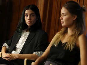 Nadezhda Tolokonnikova (L), activist and ex-wife of Pyotr Verzilov, and Veronica Nikulshina, activist and Verzilov's current girlfriend, speak to the media on September 18, 2018 in Berlin, Germany. Berlin doctors confirmed earlier in the day that there is a "high plausibility" that Verzilov, a member of the Russian activist group, Pussy Riot, was poisoned. Verzilov fell ill following a visit to a Moscow court one week ago.