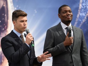 Presenters Colin Jost and Michael Che roll out the gold carpet for the 70th Emmy Awards at Microsoft Theater on September 13, 2018 in Los Angeles, California.