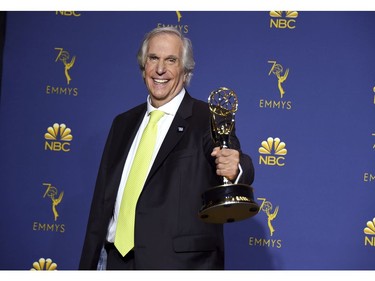 Henry Winkler poses in the press room with the award for outstanding supporting actor in a comedy series for "Barry" at the 70th Primetime Emmy Awards on Monday, Sept. 17, 2018, at the Microsoft Theater in Los Angeles.