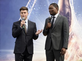 Colin Jost, left, and Michael Che, co-hosts for the 70th Emmy Awards, speak to the media before rolling out the gold carpet outside the Microsoft Theatre, Thursday, Sept. 13, 2018, in Los Angeles.