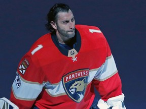In this April 2, 2018, file photo, Florida Panthers goaltender Roberto Luongo skates back onto the ice for an encore after the Panthers' 3-2 win over the Carolina Hurricanes in an NHL hockey game, in Sunrise, Fla. (AP Photo/Joe Skipper, File)