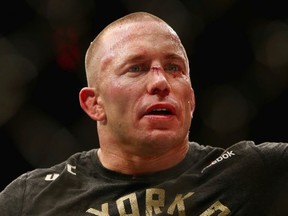 Georges St-Pierre of Canada reacts following his victory over Michael Bisping of England in their UFC middleweight championship bout during the UFC 217 event at Madison Square Garden on November 4, 2017 in New York City.