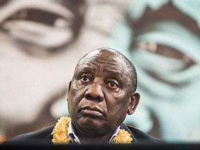 South African President Cyril Ramaphosa looks on during a meeting of the South African ruling Party African National Congress (ANC)  "Thuma Mina" (Send Me) campaign launch at the Nelson Mandela Youth Centre in Chatsworth township outside of Durban on September 8, 2018. - The campaign is a preparation for the 2019 general elections.