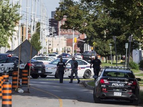 Niagara Regional Police respond to a shooting near Church St and Niagara St in St. Catharines Ont., Thursday September 6, 2018. THE CANADIAN PRESS/Aaron Lynett