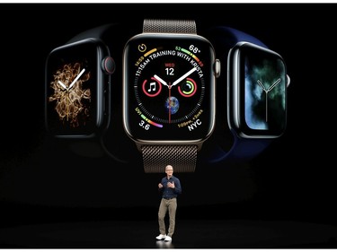 Apple CEO Tim Cook discusses the new Apple Watch 4 at the Steve Jobs Theater during an event to announce new products Wednesday, Sept. 12, 2018, in Cupertino, Calif.