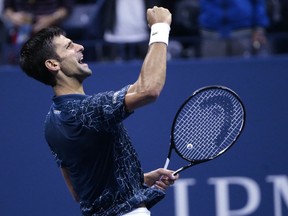 Novak Djokovic, of Serbia, celebrates after defeating Kei Nishikori, of Japan, during the semifinals of the U.S. Open tennis tournament, Friday, Sept. 7, 2018, in New York.
